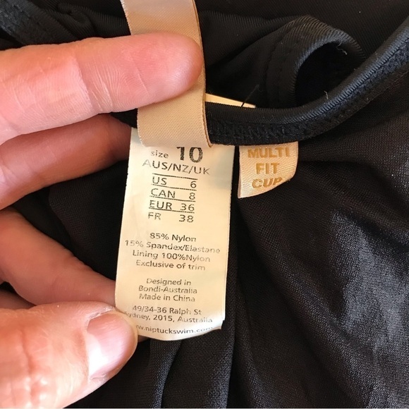 NIP tuck black one piece swim suit.  Size 6/8. - Picture 11 of 11